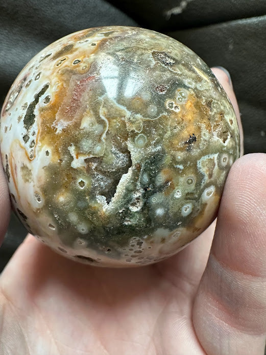 Beautiful druzy ocean jasper sphere